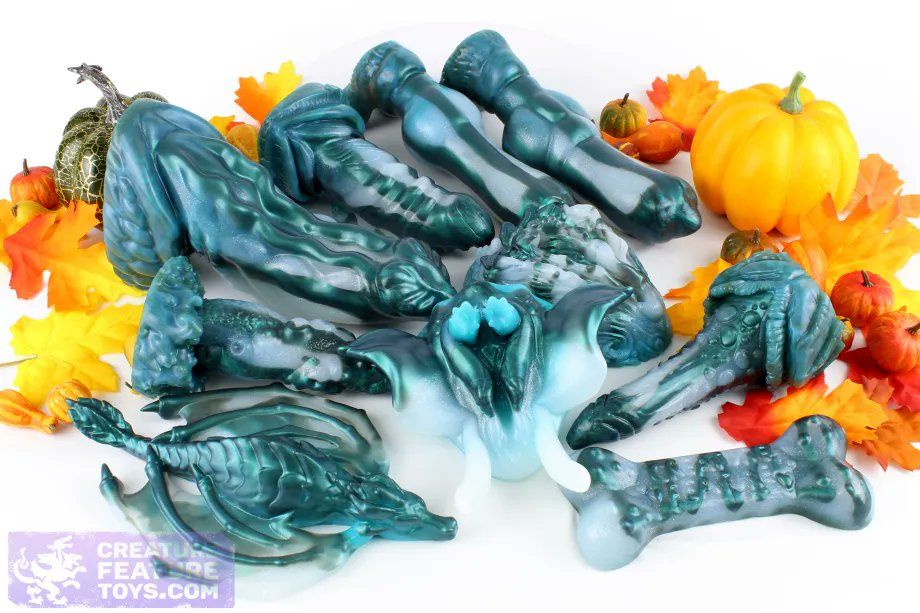 Group photo of fantasy adult toys with turquoise colorshift and diamond sparkle.