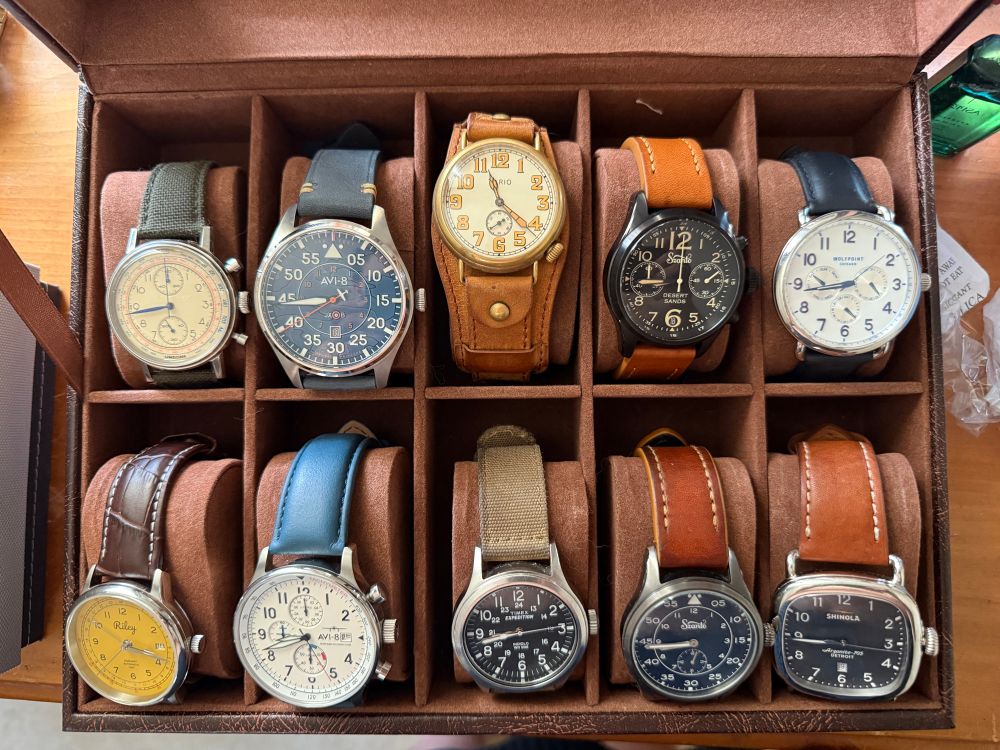 Top: Undone Vintage Killy, AVI-8 Clowes Automatic
Acklington, Vario 1918 Trench, Szanto Sands Chronograph 4551, Wolfpoint Fort Dearborn Ocean White
Bottom: Riley Amelia Earhart Automatic, AVI-8 Classic Chronograph, Timex Expedition, Szanto Heritage Aviator, Shinola Argonite 705