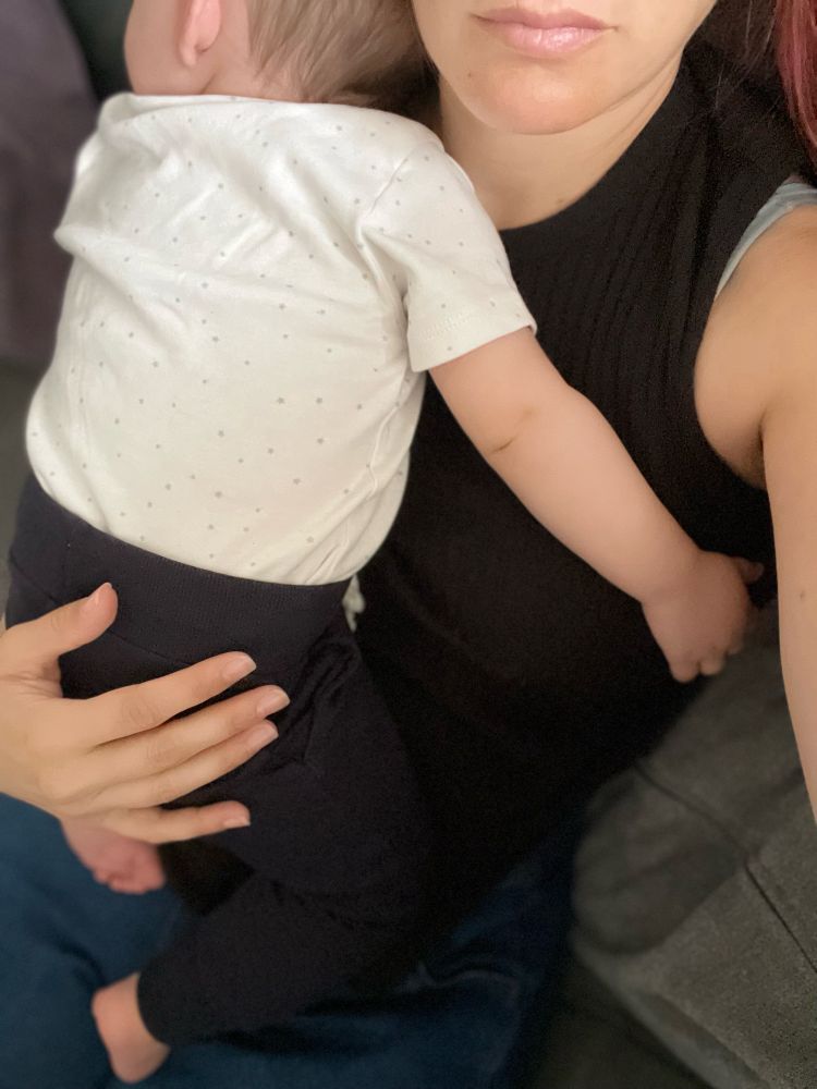 Baby sleeping on mom