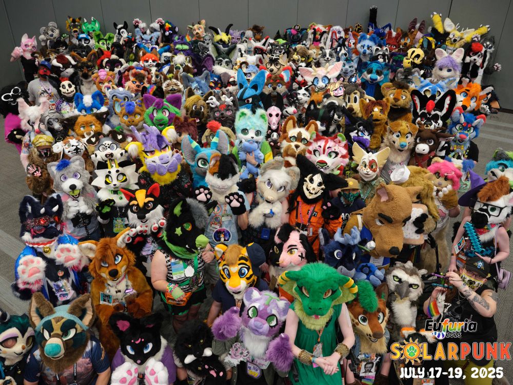 A group picture of 155 fursuiters and cosplayers together at Eufuria 2025. In the bottom right corner, the Eufuria 2025 Solarpunk wordmark, with text "July 17-19, 2025"