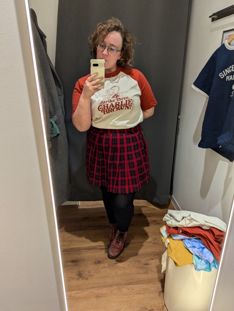 h rudds in a baseball-style tee with a wee charlie brown and "strike three, charlie brown!" underneath