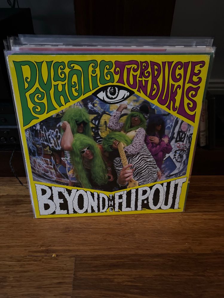 Lurid cover of the Psychotic Turnbuckles album Beyond the Flip-Out (the Turnbuckles, an obscure Australian garage-rock band from the mid-80s, are curiously referenced in Mr Dog’s cartoon)