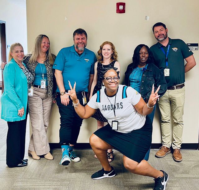 City employees wearing teal 