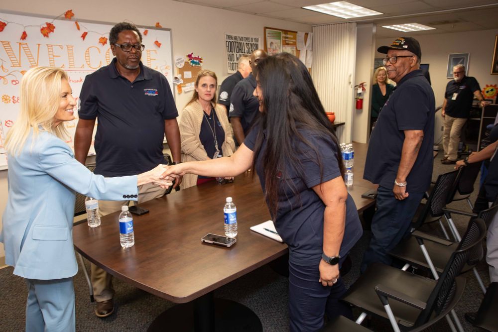 Mayor Deegan shaking hands with a member of othe MAVD team