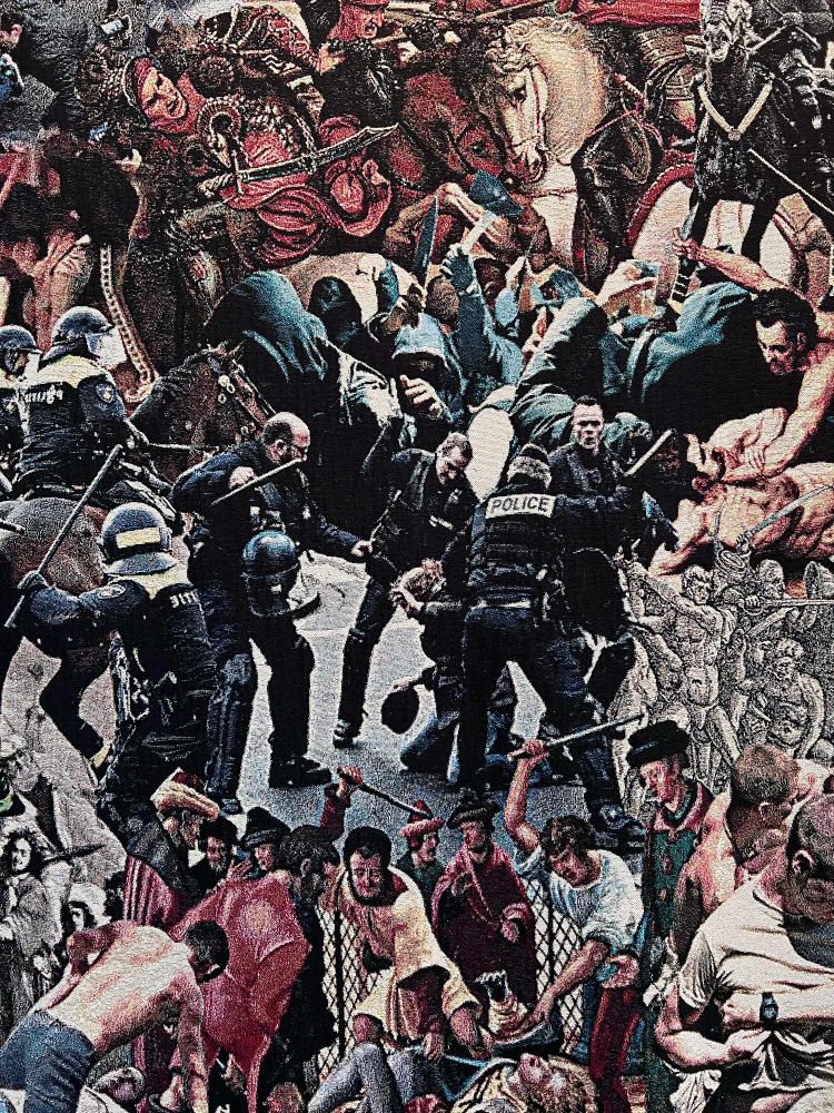 Tapistery showing photos and classical paintings of people being beaten by police forces