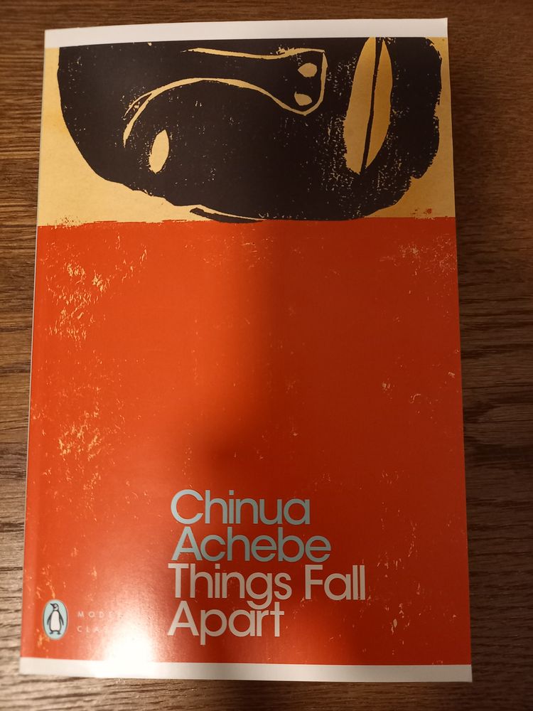 Book cover of Chinua Achebe Things Fall Apart
Mainly red