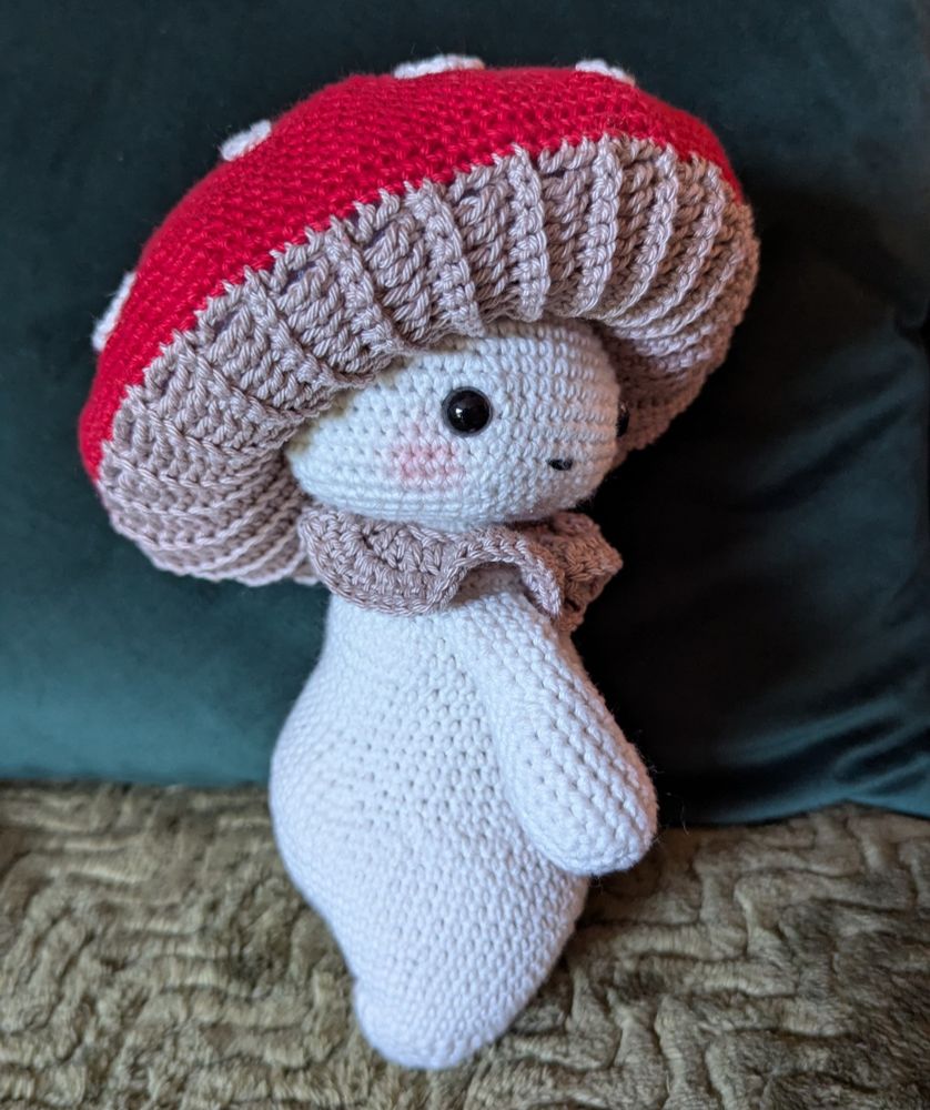 Crochet mushroom amigurumi character side view 