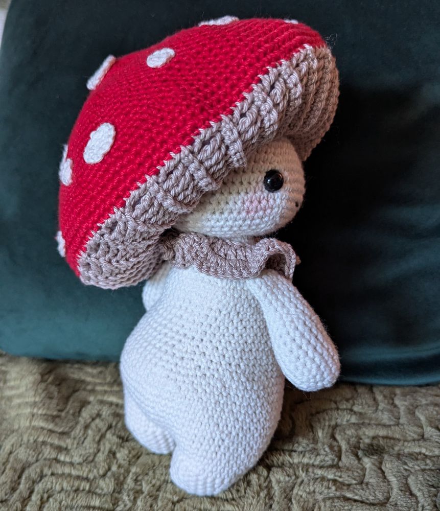 Crochet mushroom amigurumi character butt view 