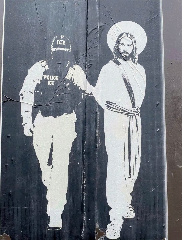 Black and white stencil-style artwork showing an ICE officer gripping the arm of a robed, sandaled figure resembling Jesus. The stark contrast and minimalist design evoke tension, highlighting themes of state power, religious identity, and moral confrontation.
