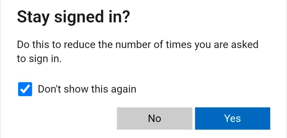 A dialog box asks if the user wants to stay signed in to reduce sign-in prompts. A checked checkbox labeled "Don't show this again" appears above two buttons: "No" (gray) and "Yes" (blue).
