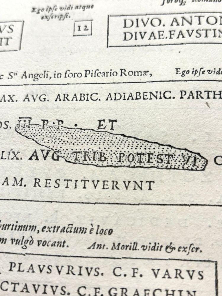 Detail of a woodcut integrated in a typeset text to display visual damage on a funeral stone.