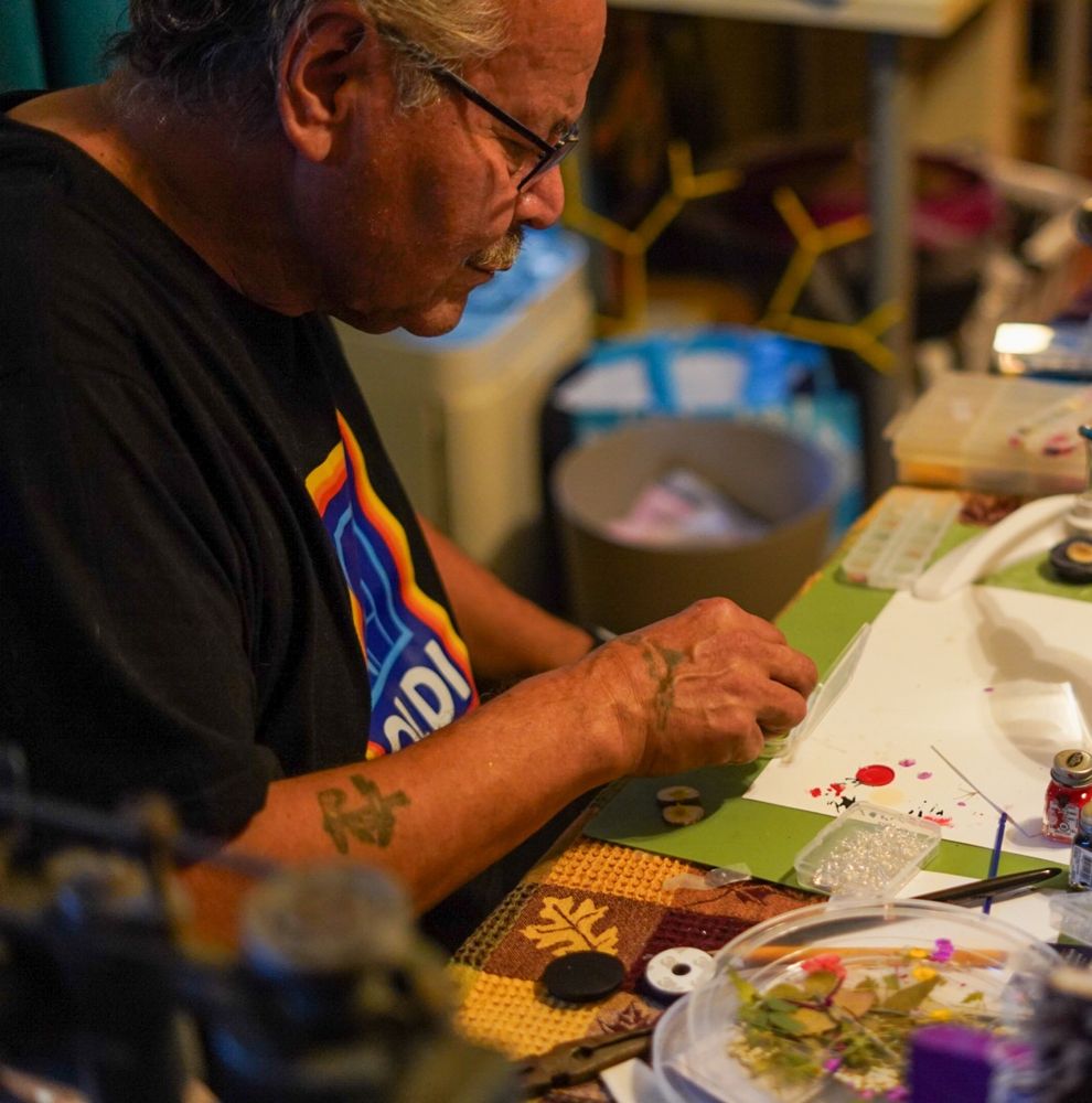 my dad making earrings