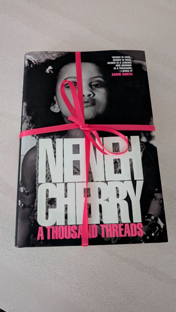 A thousand Threads by Neneh Cherry lying on worktop 