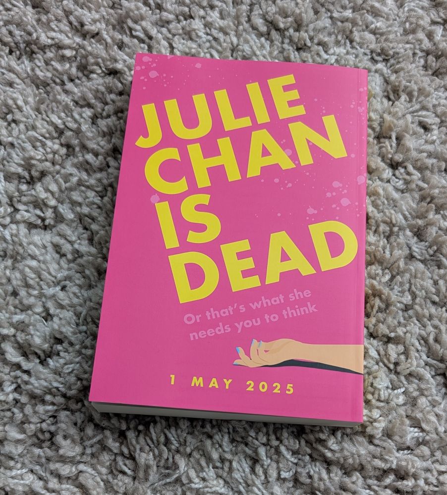 Julie Chan is Dead by Lianne Zhang lying on rug