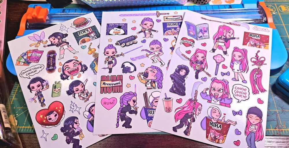 Chibi art of Rumi, Zoey, and Mira from Huntrix (Kpop Demon Hunters) in cute chibi style!