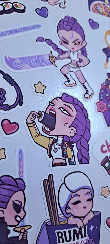 A sticker sheet of Rumi from Huntrix in cute chibi style!