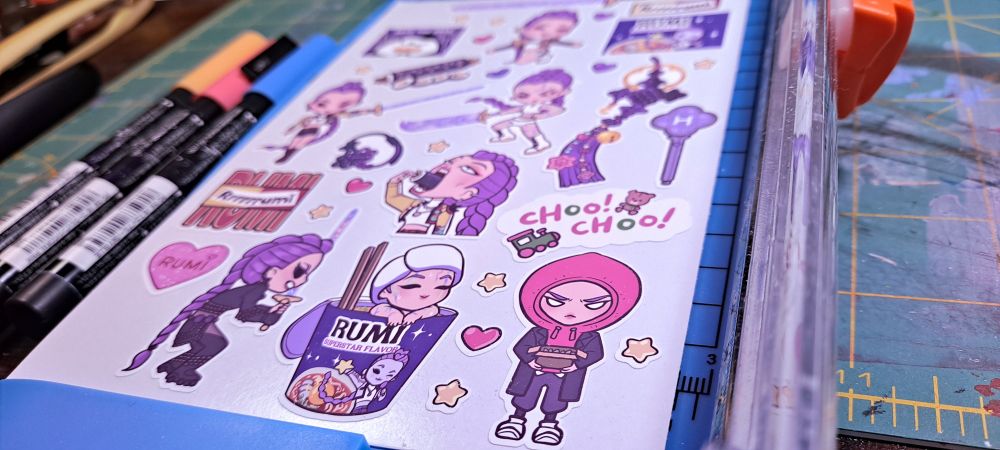 A sticker sheet of Rumi from Huntrix in cute chibi style!