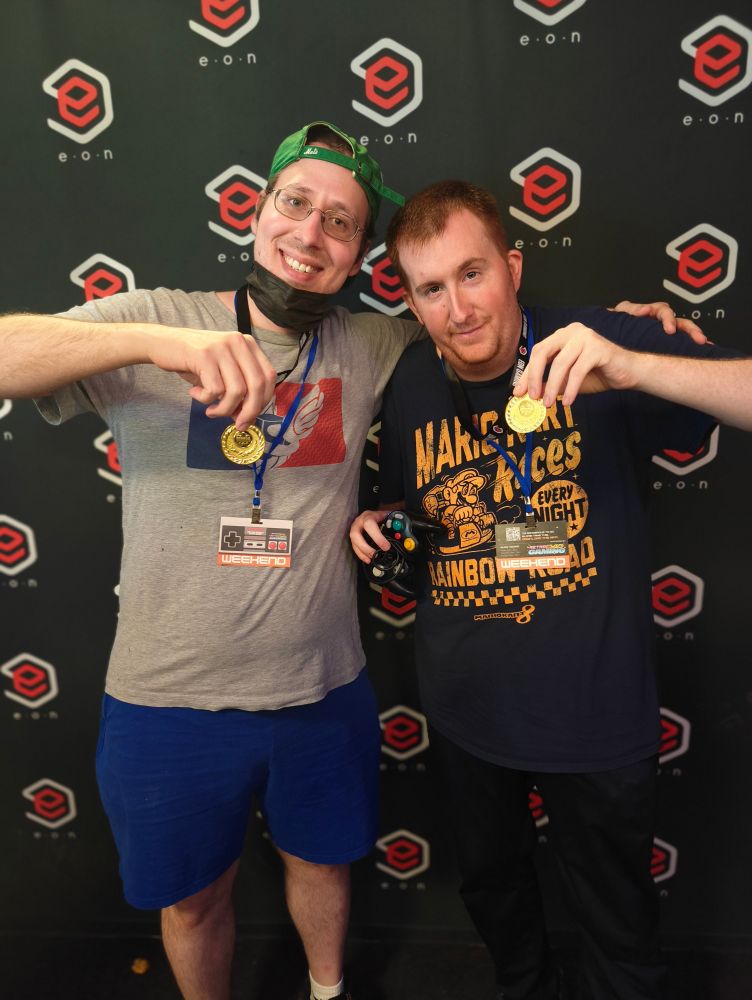 Maple and Mike pose with their 1st place medals.