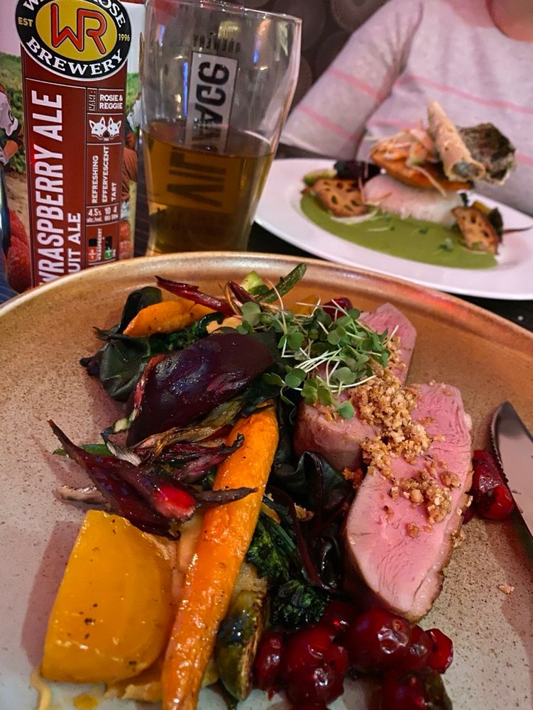 Raspberry fruit ale from Wild Rose Brewing alongside a fantastic duck breast sous vide at Little Chief restaurant. 