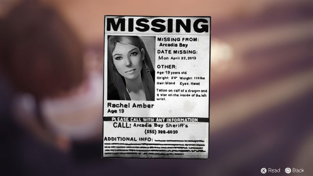 Screenshot from the game Life is Strange. It shows a missing person's poster for Rachel Amber. Her picture shows a young woman with long hair and a feather earring. The info reads "Missing from Arcadia Bay. Date missing Monday, April 22, 2013." Additional miscellaneous info is listed underneath to contact with information.