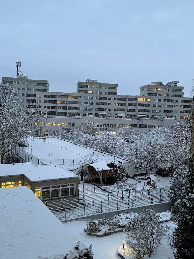 Snow covered berlin courtyard 