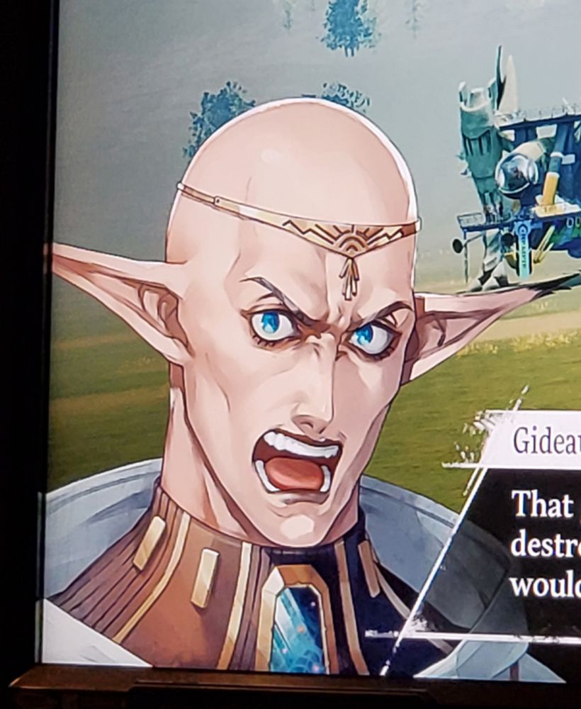 Gideaux from Metaphor reFantazio, who is a bald elf.
