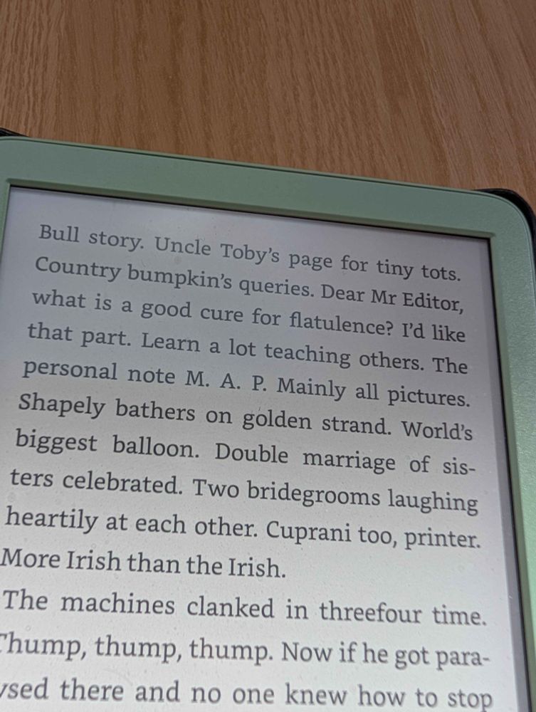 An e-book reader showing a page of text from Ulysses. The top line is "Bull story. Uncle Toby's page for tiny tots."