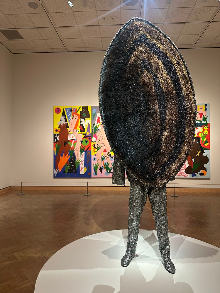 Nick Cave work (silver Soundsuit sculpture) in foreground 