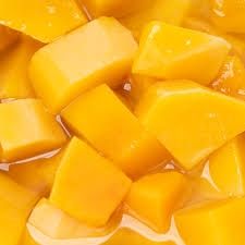mango chunks floating in pineapple juice