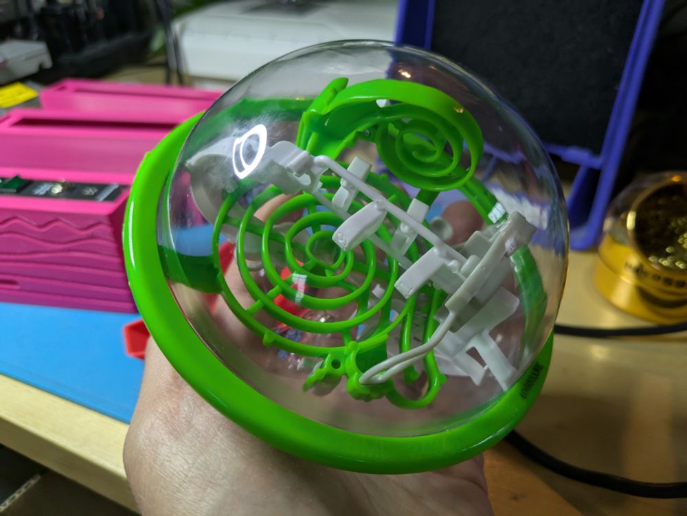 A Perplexus Go globe in my hand