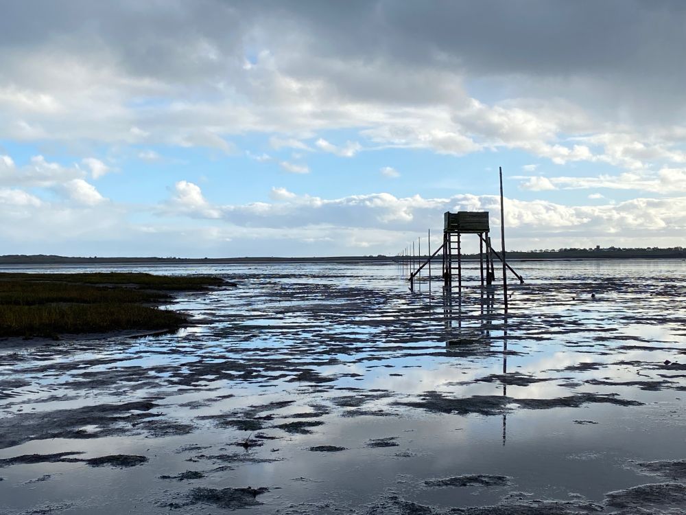 A raised refuge to shelter from the sea on the walking route to Lindisfarne.