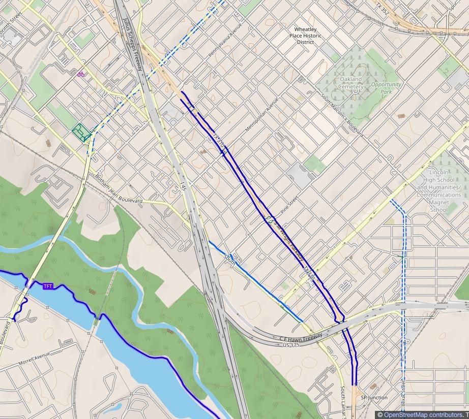 A CyclOSM map of South Dallas, highlighting the 12' shared-use paths on either side of S M Wright Boulevard, which used to be Freeway.
