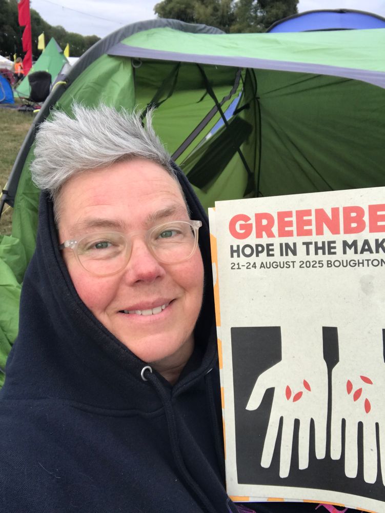 Mad woman with book page saying ‘Greenbelt - hope in the making’