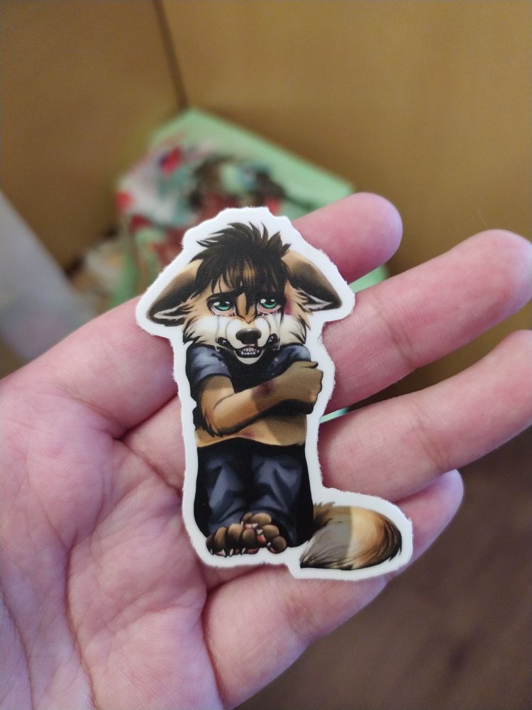 the infamous picture of the crying furry kid watching their parents fight out of scene, as a sticker