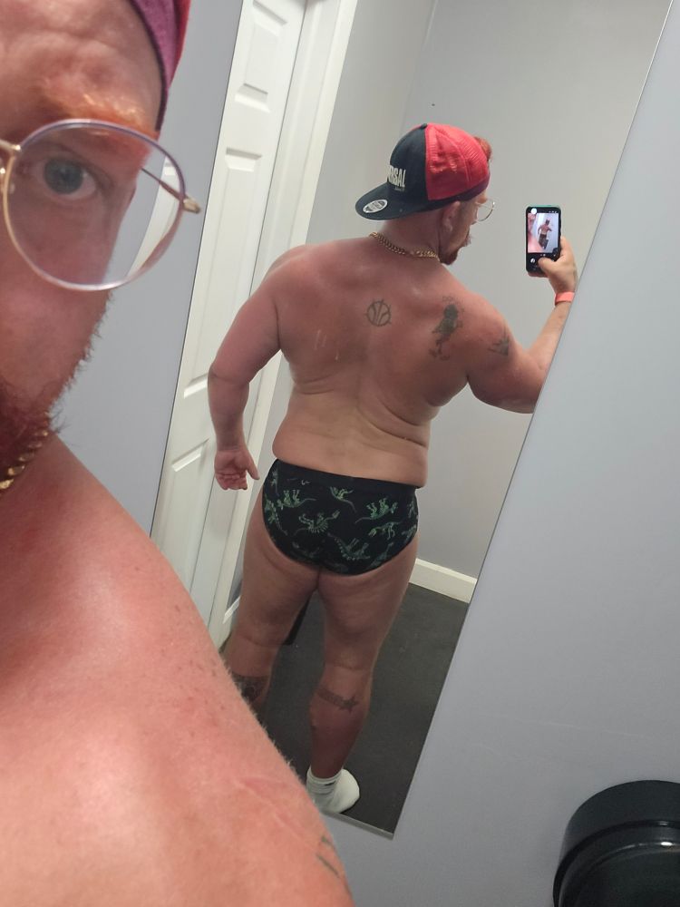 Now just standing relaxed, you can still see separation between the back muscle groups.