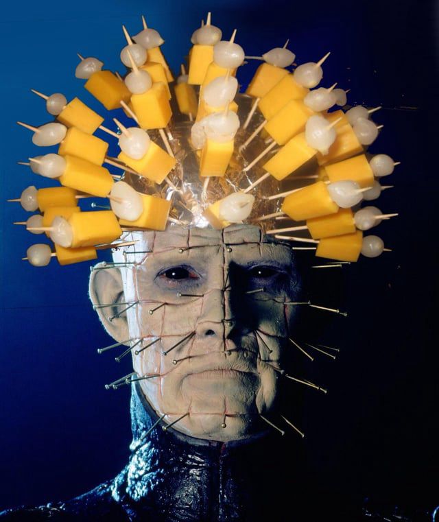 80s party Pinhead is bottom half Pinhead from Hellraiser and top half pickles and cheese blocks on cocktail sticks. 