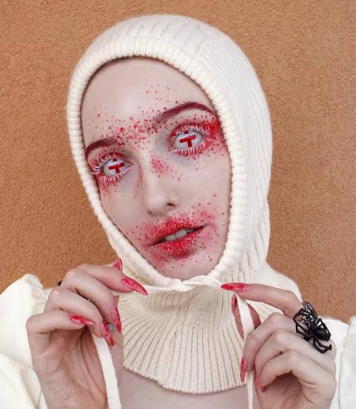 A horror themed dress up and the contact lenses are St George’s crosses