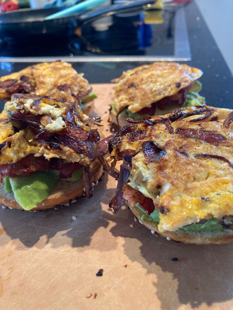 I was dreaming of these all night. Bagel breakfast sandwiches. The stack up includes my freshly homemade everything bagel, avocado, bacon, and scrambled eggs/red onion cooked in the bacon grease. And the elixir (because most of what I post is elixir-related): Tabasco sauce