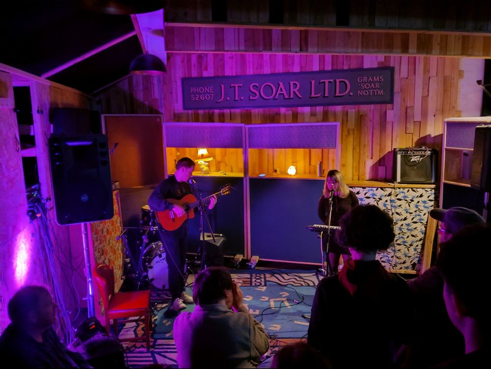 A band performing in a music venue.