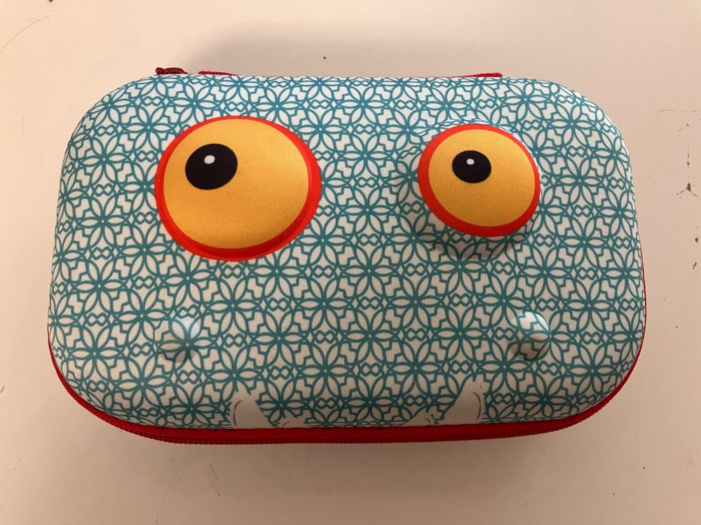 Kids school supply case that looks like a monster. 