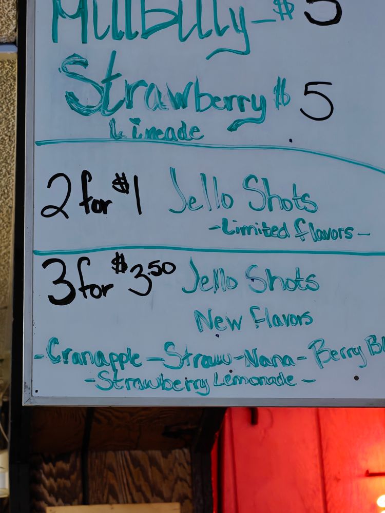 A sign for 2 for $1 yellow shots but underneath it said 3 for $3.50 jello shots with new flavors. Bit of a conundrum. 