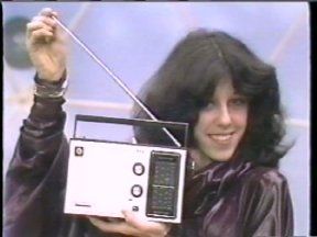 Cindi Kennedy with a radio 