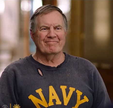 coach bill belichick in a Navy sweatshirt that it looks like he used a weed whacker on 