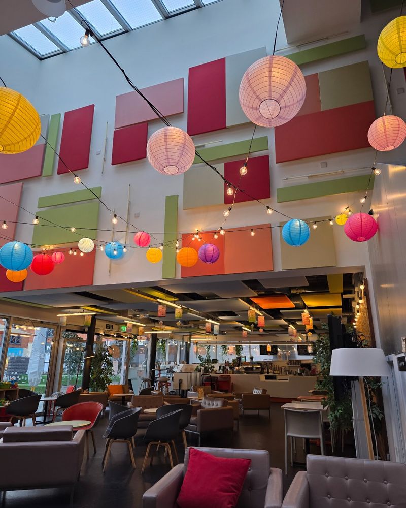 Japanese glowing lanterns decorate the cosy looking cafe at Cornerstone Arts Centre