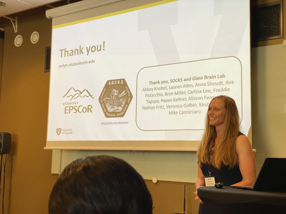 female scholar presenting a parallel talk, engaging with the audience 