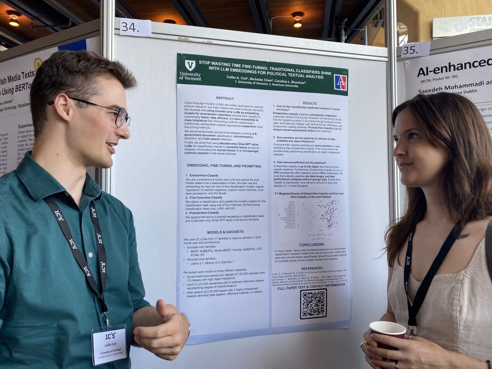 PhD student presenting a research poster 
