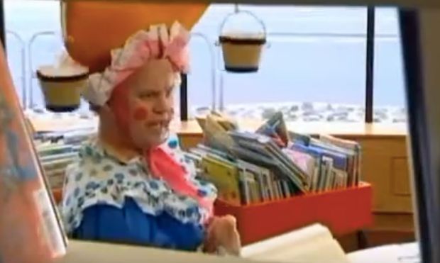 Mr Tumble as Aunt Polly in the library