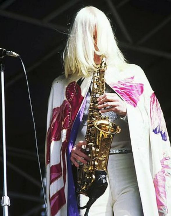 edgar winter in a fabulous cape playing saxophone