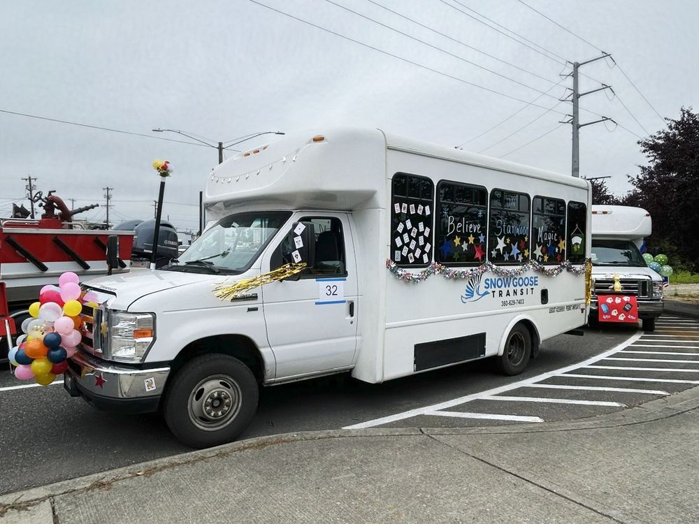 A Snow Goose Transit bus decorated for the 2025 Stanwood-Camano Parade's magical theme.