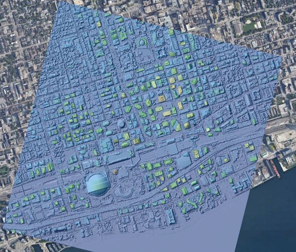 A hillshade colored by elevation of downtown Toronto draped on Google Earth imagery.